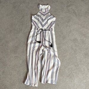 Elegant Cream and Gray Striped Jumpsuit with Flowing Palazzo Legs